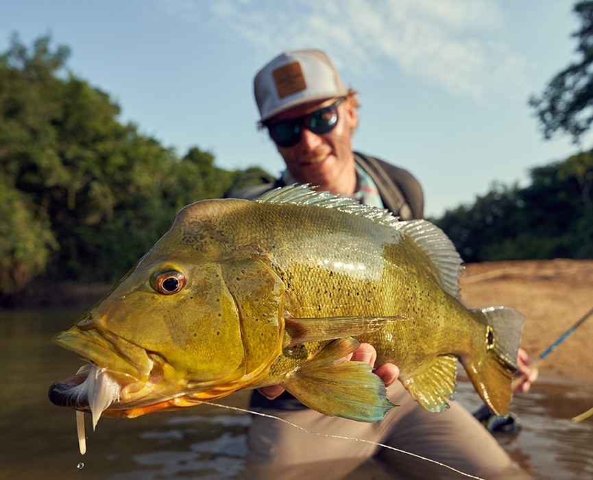 Guias profissionais de pesca e guias nativos.